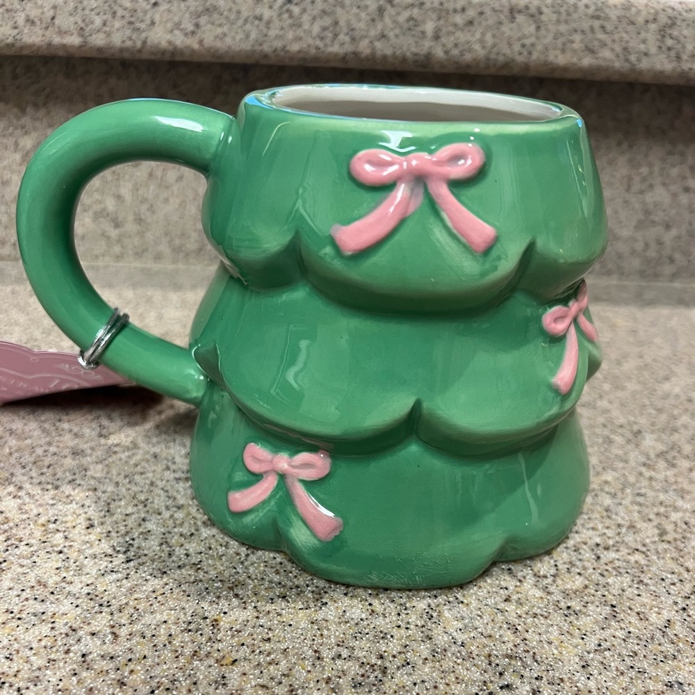 Viral Christmas tree cup with pink bows.  Hand painted and new with tags.
